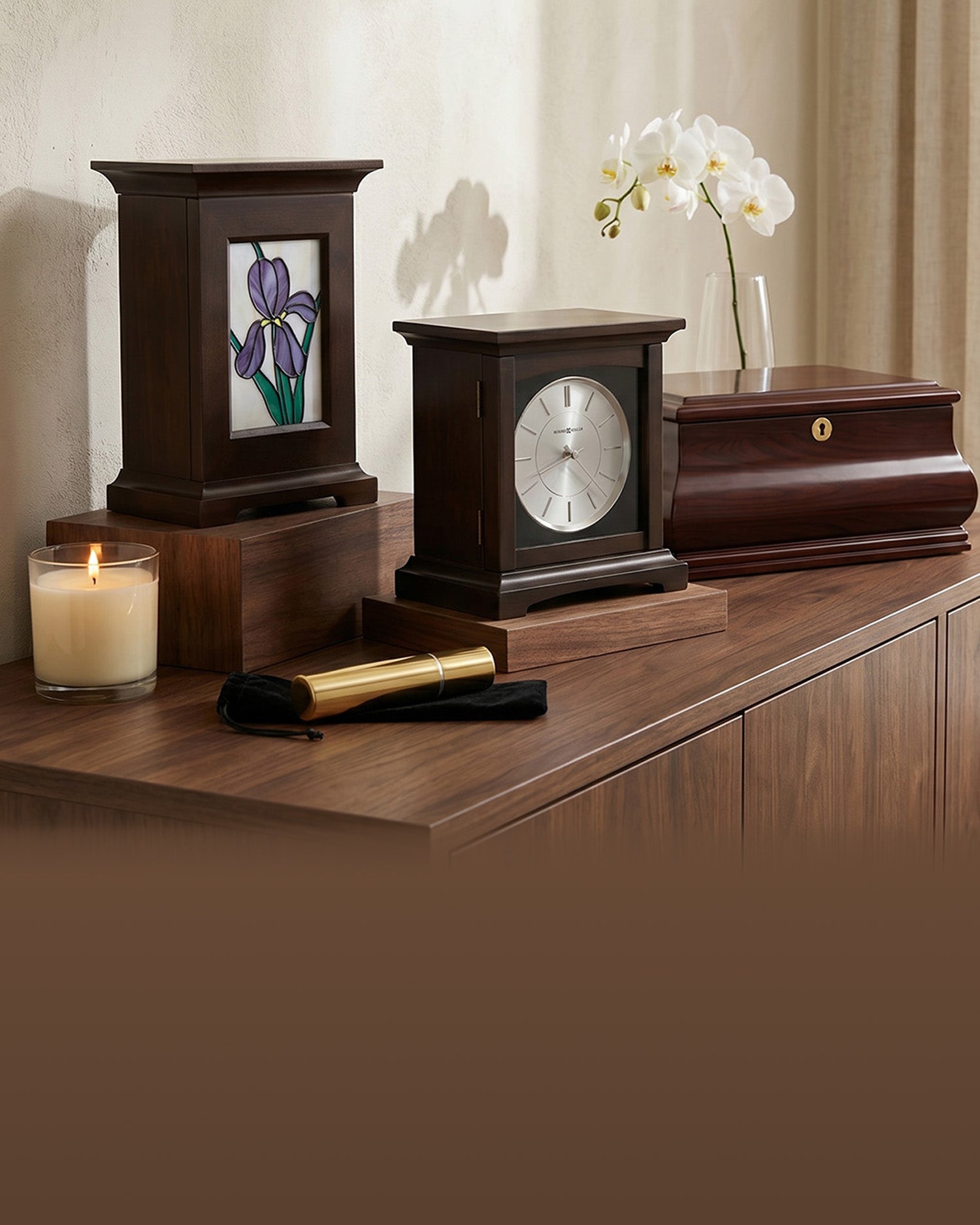 Wooden decorative items including a clock, photo frame, and candle on a wooden surface.