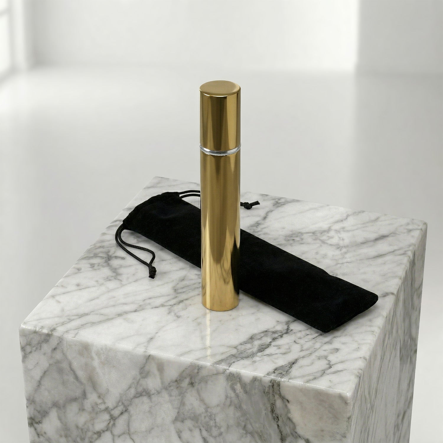 Bronze scattering tube on a marble top