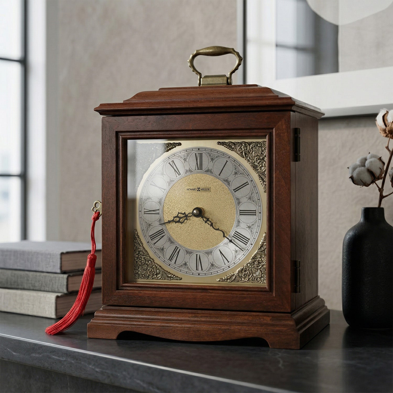 Wooden urn clock with decorative face on a shelf