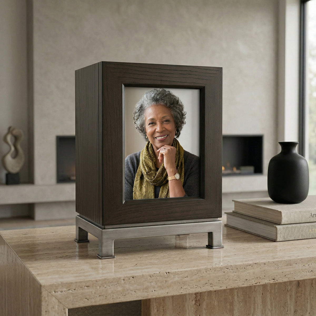 Framed photo of a woman in a dark wood portrait urn on a sofa table