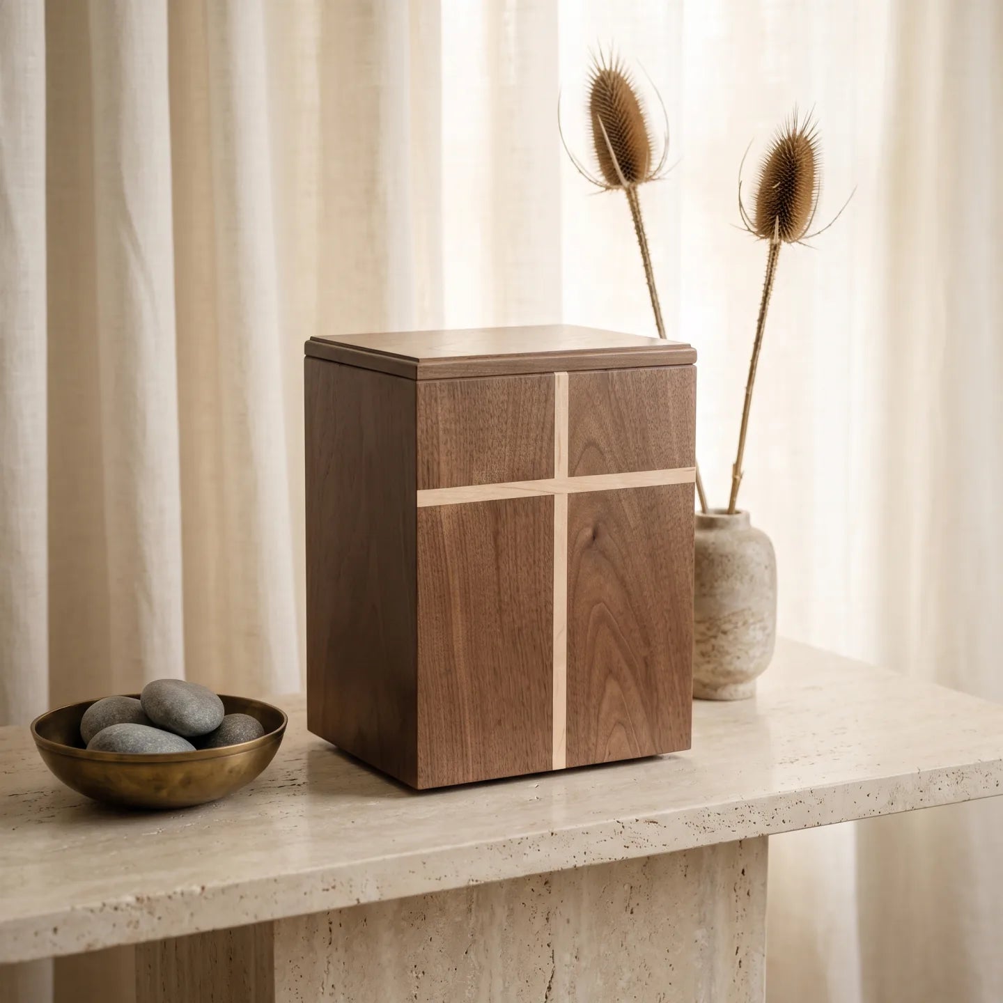Covenant IV Walnut Urn displayed on a console table in a warm, softly lit home interior