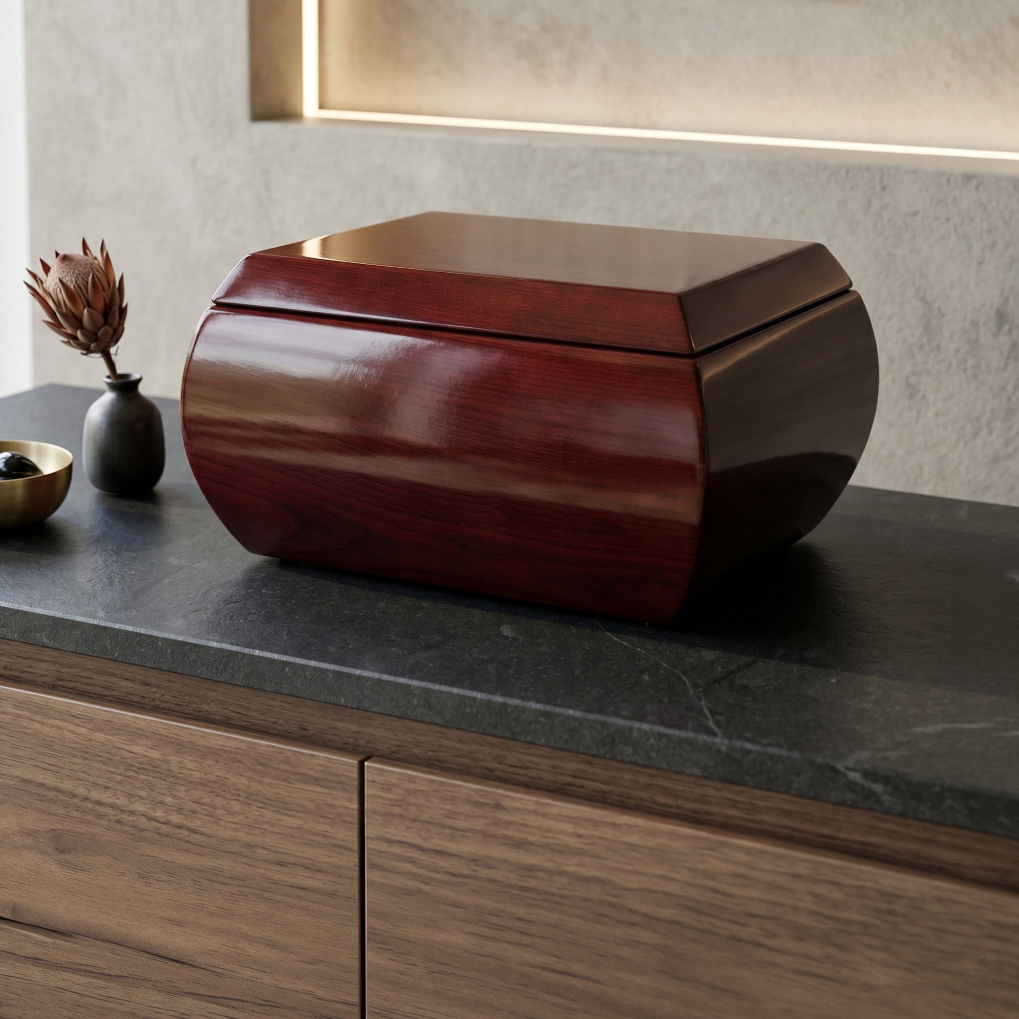 Wooden casket on a dark surface with a neutral background