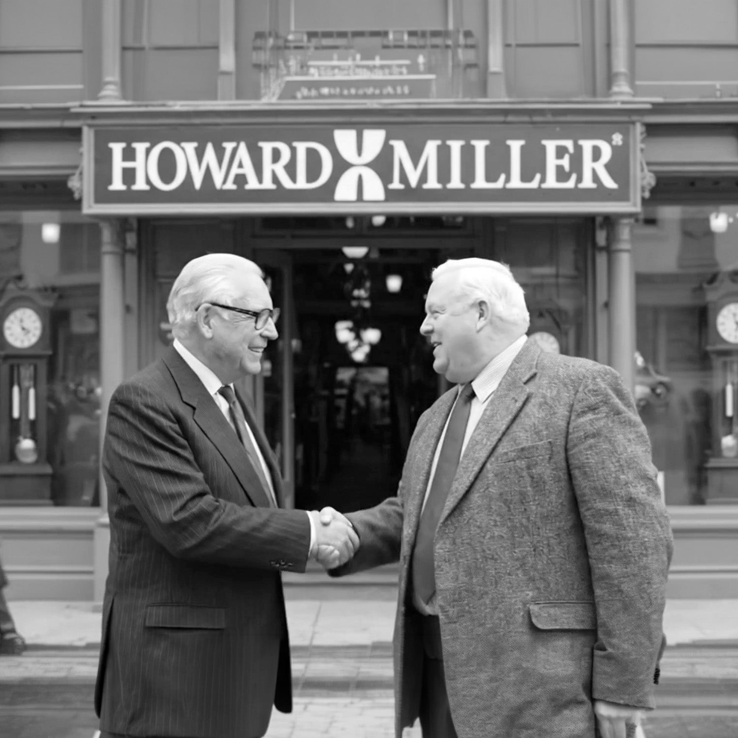 Two men shaking hands in front of a Howard Miller clock store.
