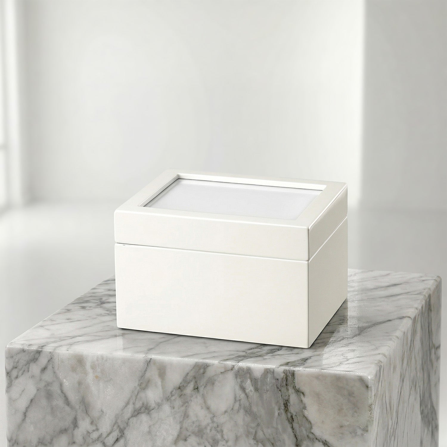 White portrait urn chest on a marble surface with a white background