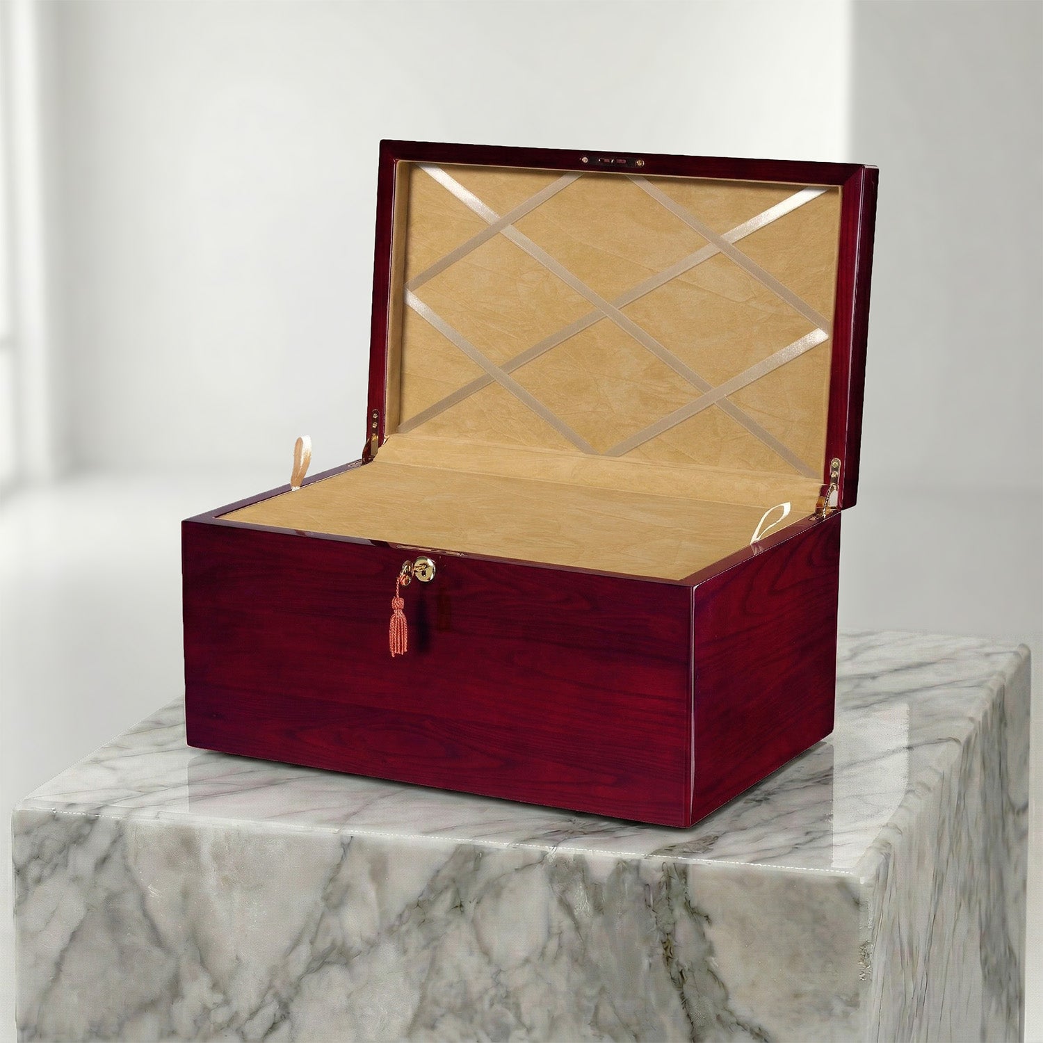 Wooden urn box with glass lid on a marble surface